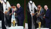 Seremoni öncesi ilginç anlar! Katarlılar, Messi'ye kupayı kaldırtmadan önce geleneksel kıyafetlerini giydirdiler