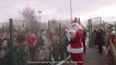 Father Christmas arrives by helicopter at Barden Junior School Burnley