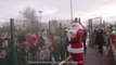 Father Christmas arrives by helicopter at Barden Junior School Burnley