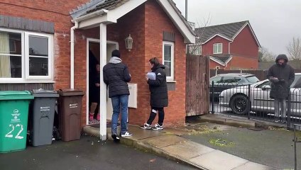 Nicky Butt delivers Christmas presents to children in Gorton