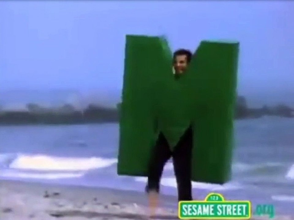 Letter M on the Beach