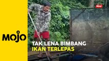 Penternak ikan bimbang arus deras Sungai Kelantan