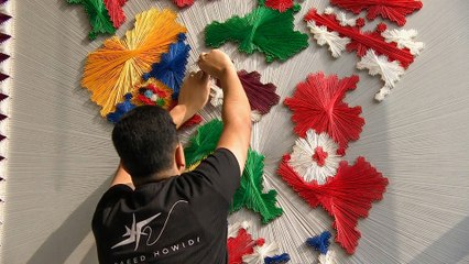 فخر عربي.. فنان عراقي يصمم لوحة تذكارية للمونديال بالخيط والمسمار