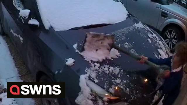 Schoolboy leaves dad's new car covered in scratches after clearing snow off bonnet with a SHOVEL
