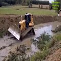 CAT D6 makes a fish pond and CAT D6 gets stuck in the pond nz6o
