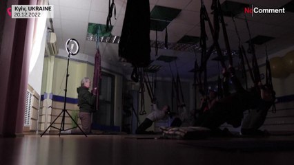 Ukraine's yogis breathe through wartime blackouts