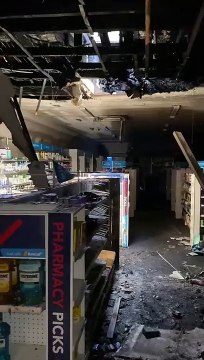 Inside fire-ravaged Amcal Plus Woonona - December 22, 2022