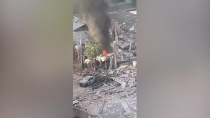 Flames rise from debris after two restaurants destroyed by explosion in Brazil