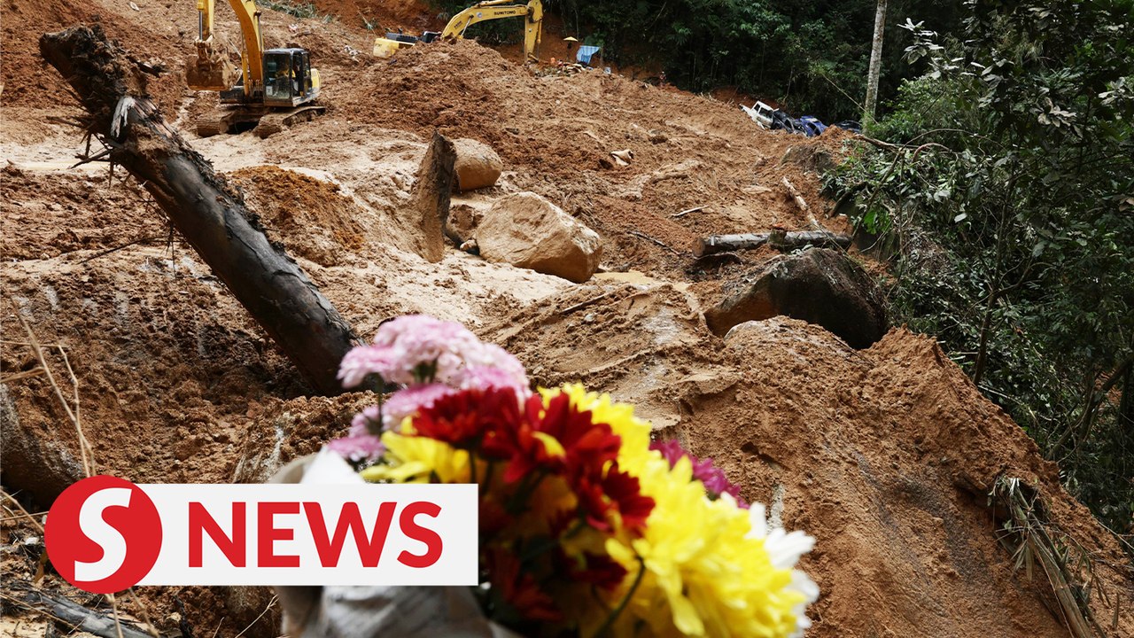 Floral tributes left at site of Batang Kali landslide