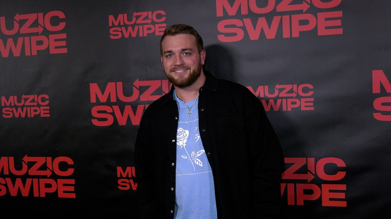 Cade Ellis "MuzicSwipe Holiday Party" Red Carpet Event in Los Angeles