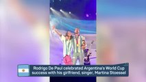 De Paul celebrates with the World Cup on stage with girlfriend