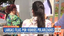 Largas filas por vidrios polarizados
