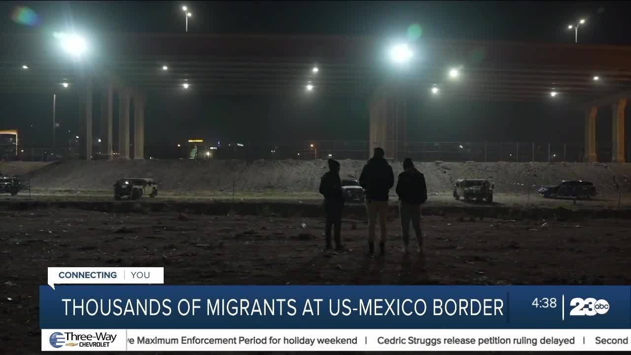 Migrants wait in the cold at the southern border