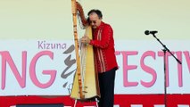 Awesome harp player Mario Gonzales playing at Japanese festival.