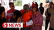 Batang Kali landslide: Govt hands over donation to two families of victims