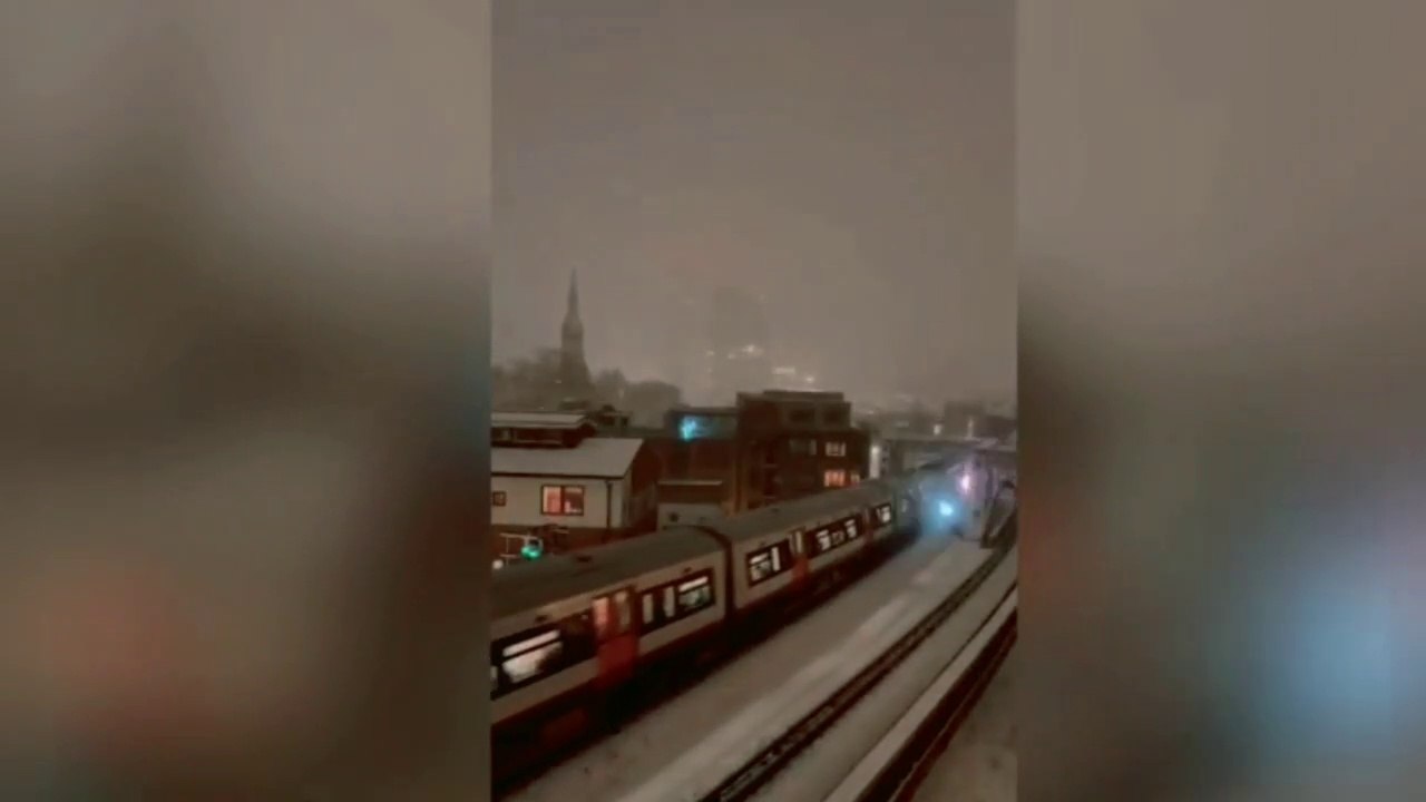 Snow Storm Causes Havoc For London Train Tracks With Spectacular Sparks