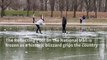 Reflecting Pool covered with ice on National Mall in US capital