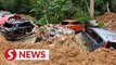 Police have traced as many as 20 cars buried in Batang Kali landslide