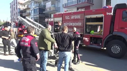 Yangın nedeniyle çatıda mahsur kalan 8'i çocuk 13 kişi kurtarıldı