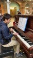 Piano prodigy plays for London commuters to raise money for foodbank