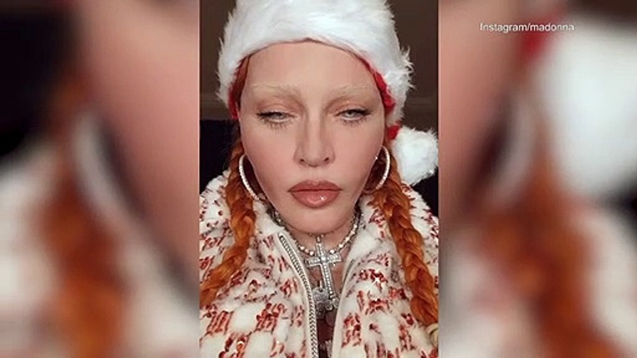 Madonna celebrates Christmas posing as Santa with her children
