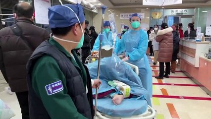 Chinese hospitals 'extremely busy' as COVID spreads