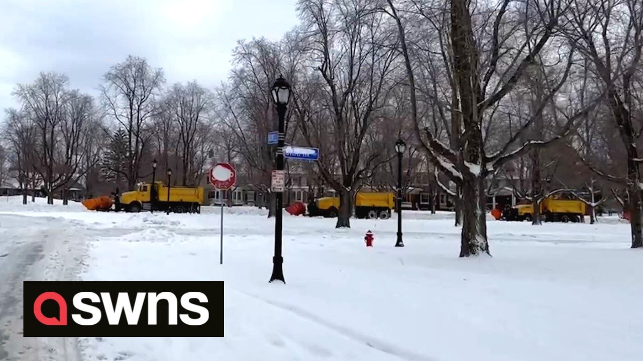 Huge queue of snow ploughs seen in Buffalo as they prepare to tackle damage caused by storm Elliot
