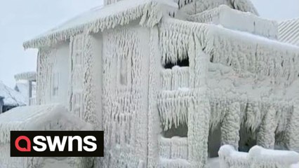 Homes encased in thick layer of ice after storm Elliott wreaks havoc across North America