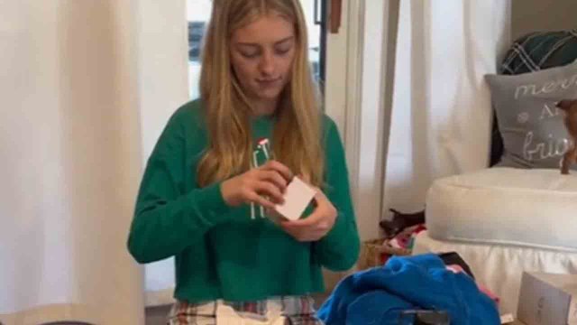 Girl is at a loss for words after finding keys to her favorite car in her Christmas gift box