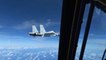 Moment US plane narrowly-misses collision with Chinese fighter jet
