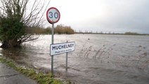 UK floods: Train station tracks submerged in Scotland after torrential rain