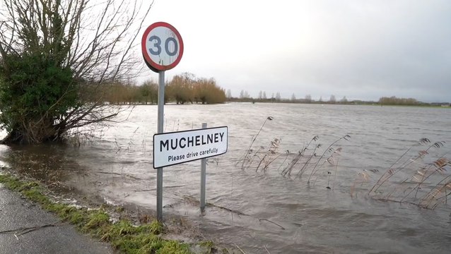 UK floods: Train station tracks submerged in Scotland after torrential rain