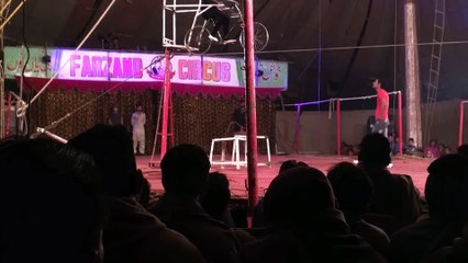 Girl Riding Worlds Smallest Bicycle on Rope