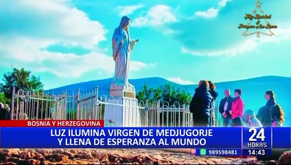 Скачать видео: Luz ilumina a virgen de Bosnia y llama la atención de miles de fieles en el mundo