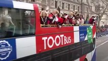 London mayors wave to crowds from open-top bus during New Year's Day parade