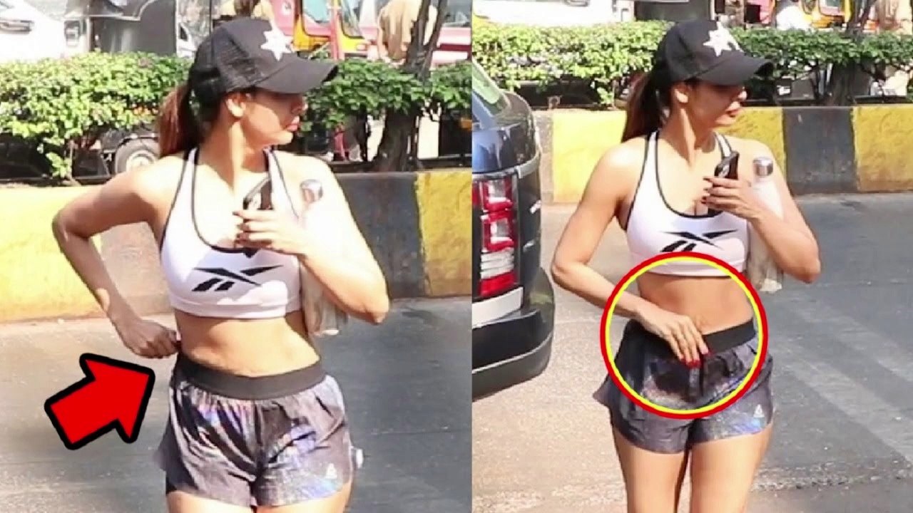 Malaika Arora Adjusting Her Pant On Road Outside Gym and walking like a duck