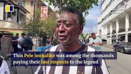 Pele lookalike joins thousands paying last respects to Brazilian football legend
