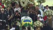Football legend Pele's son visits his father lying in state during tribute at stadium in Santos