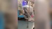 China subway passenger wears DIY full-body mask as Covid cases surge