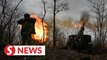Civilians flee fierce fighting in Ukraine's Bakhmut amid news of ceasefire