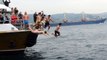 Ortaköy’deki haç çıkarma töreninde denize atladı, başından yaralandı