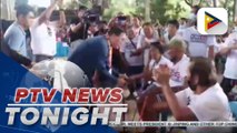 Sen. Go, DSWD distribute aid to flood victims in Misamis Oriental on Christmas Eve, Christmas Day
