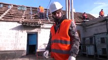 War in Ukraine: Volunteers repair houses damaged by Russian shelling