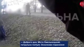 Ukrainian police rescue civilians who were fired upon by Russians in the street