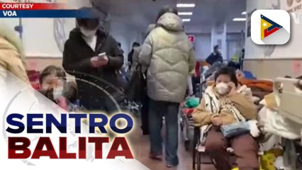 Descargar video: Mga ospital sa China, napupuno na ng COVID-19 patients; 18 body bags, namataang inilalabas sa isang ospital sa Shanghai