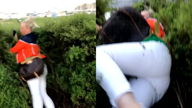 Mom takes a fall in the most 'graceful' way after daughter pushes her into a bush