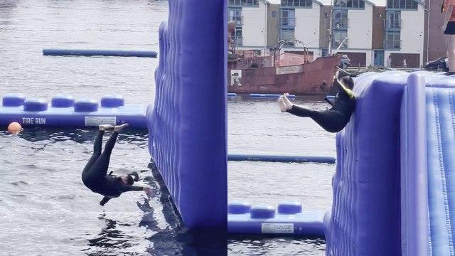 Girl goes SPLASHING into the water after botching jump off inflatable water park