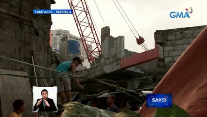 3 bahay, nabagsakan ng bahagi ng katabing gusali na ginigiba para sa itinatayong NLEX-SLEX Connector | Saksi