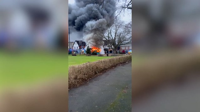 Thick smoke billows as Manchester bus engulfed by flames during rush hour