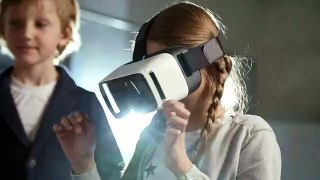 A Girl Wearing A Virtual Reality Headset ·